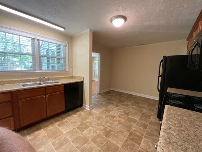 Building Photo - 2br,1ba w/ carport and detached storage bu...