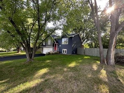 Building Photo - "Charming Anoka Retreat: 3-Bedroom Home with Finished Basement & Large Yard with Fence!"