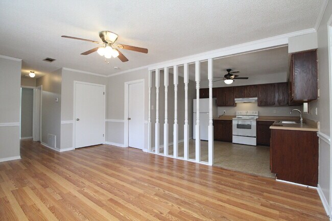 Building Photo - Spacious Bellview 2BR/1.5BA Duplex with Large New Front Deck, Fenced Backyard & Covered 2-Car Car...