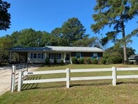 Building Photo - Beautiful Home in a quiet country setting