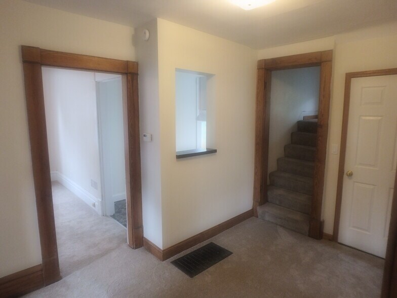 Doorways to Living Room, Kitchen and stairs to Upstairs Loft from the Entry Room - 1188 S 4th St