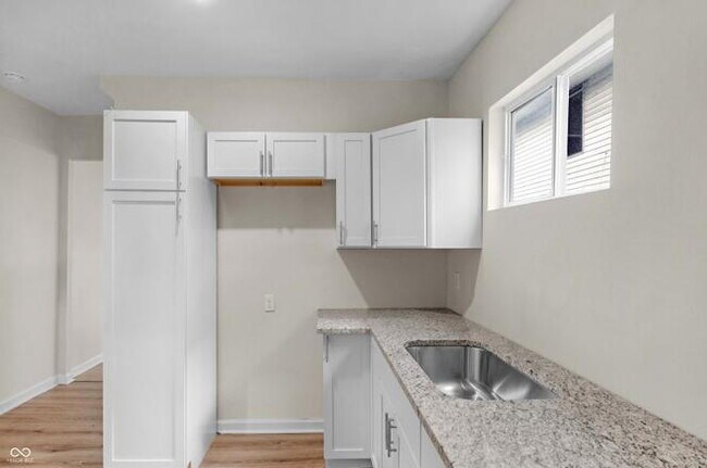 Building Photo - "Charming 3-Bed Duplex with Modern Comforts at 2235 MLK Jr Street, Indianapolis!"