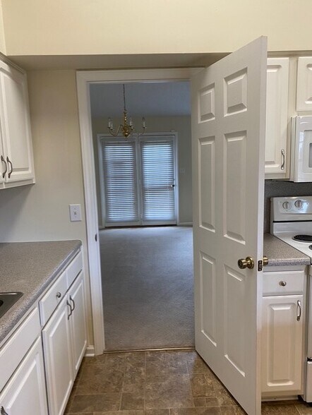 kitchen towards great room - 3923 Cloverwood Meadow Ln
