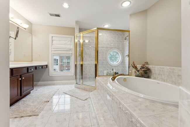 Building Photo - Discover this stunning four-level townhous...