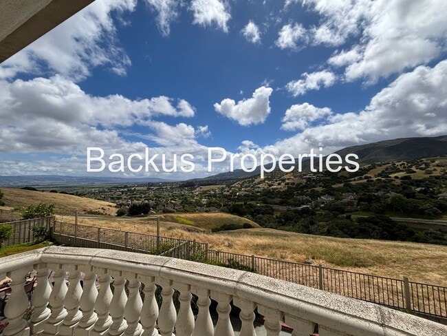 Building Photo - Great two-level home in Las Palmas II with scenic views