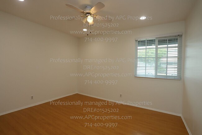 Building Photo - 8229 Woodland Dr