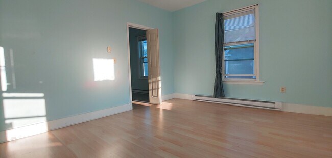 LR separated by a bifold door. - 58 Paine St