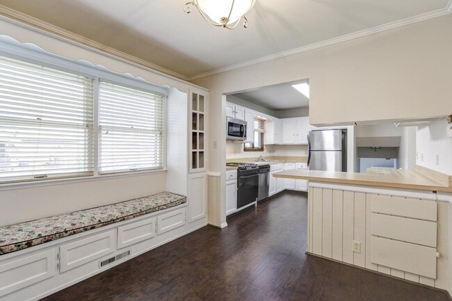 Building Photo - Split-Level Home With Fenced Yard In Quiet Residential Area