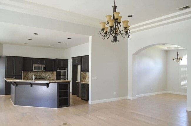 Building Photo - Spacious Riverlakes Golf Course Home with Pool, Spa & 3-Car Garage