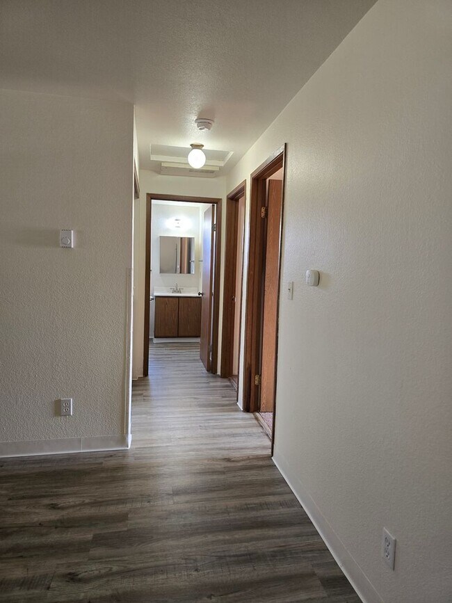 Building Photo - Upper Floor 2 Bedroom with Carport