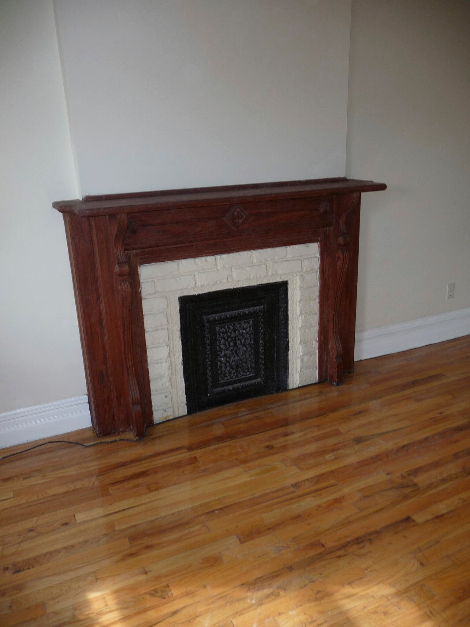 Living room fireplace mantel - 13 Revere Pl