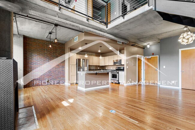 Building Photo - Modern Industrial Condo Downtown with Park...