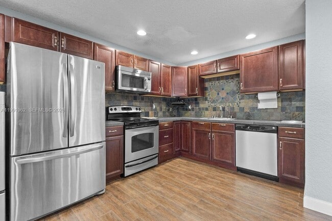 Building Photo - 8069 SW 18th Ct