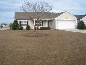 Building Photo - 3 Bedroom 2 Bath home with 2-car garage