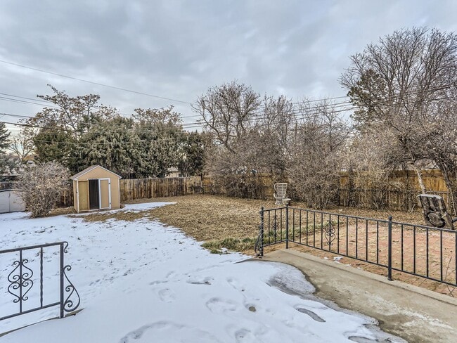 Building Photo - Evolve Real Estate: Available 8/8/26 Brick Tudor with Large Yard and Finished Basement!
