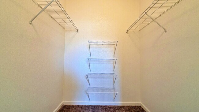 Building Photo - NEW CARPET NEW PAINT!! Clean and Bright 2BR 2BTH Condo Close To DIA. Gated Community in First Cre...