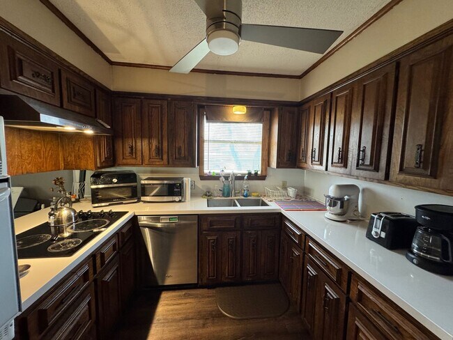 Building Photo - Corner Lot Home with Beautiful Trees