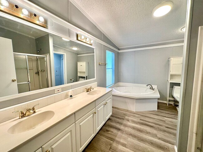 Building Photo - Privacy and Space in this 3/2 Home at the ...
