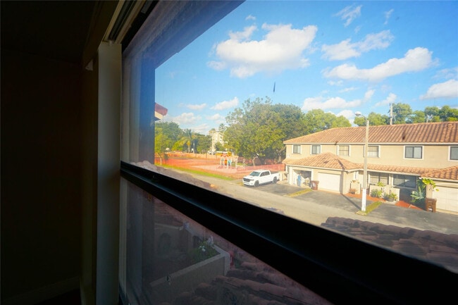 Building Photo - 6380 W 24th Ct