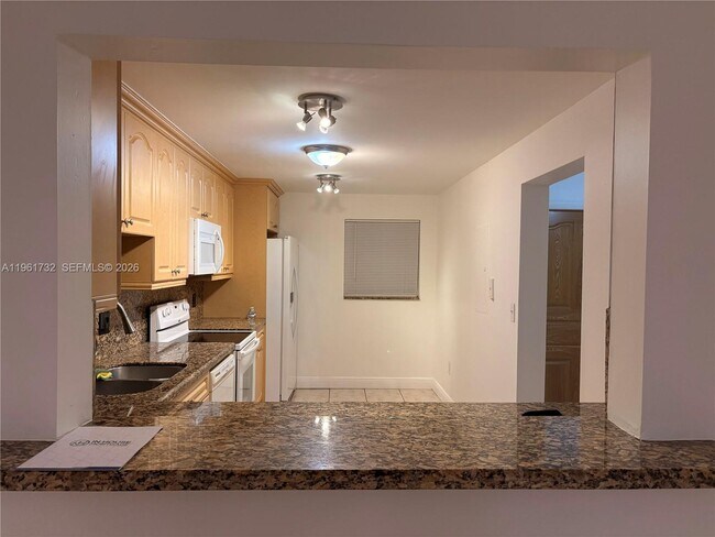 Building Photo - 3855 Estepona Ave