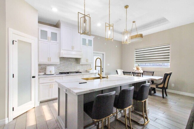 Building Photo - "Luxurious 4-Bed Oasis with Pool & 3.5 Baths in McAllen's Prime Locale!"