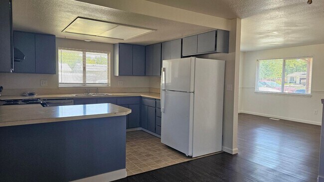 Building Photo - Spacious 4-Bedroom Home – New Updates, Fen...