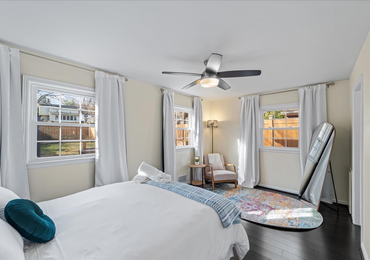 The master bedroom looks into the backyard and receives a fair amount of natural light. - 706A W Glebe Rd