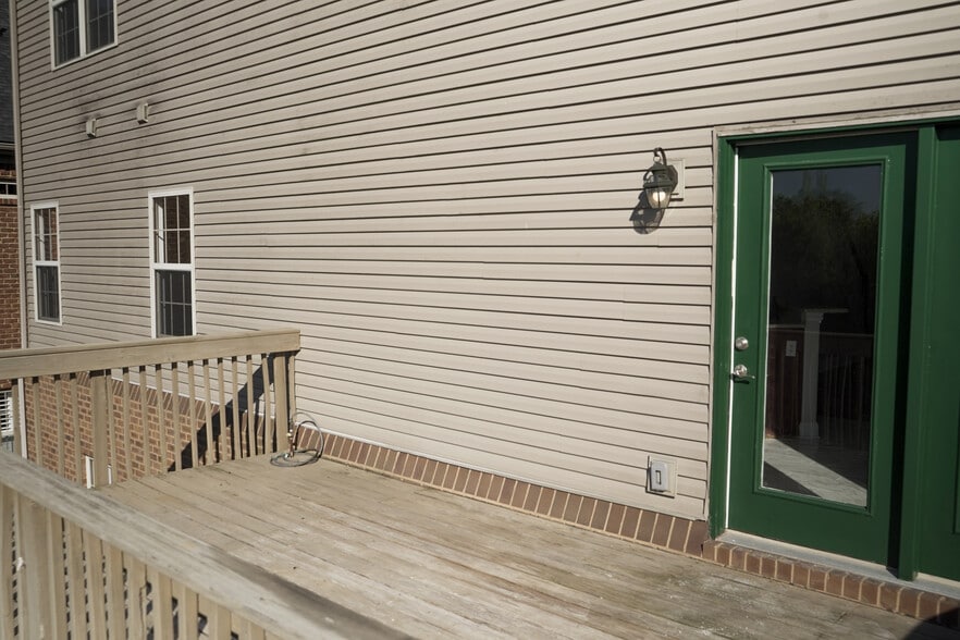 Raised Deck and door into Dinning area and kitchen - 393 Hays Blvd