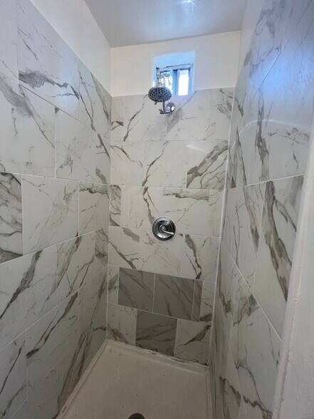 Tile shower - 122 E Quintard St