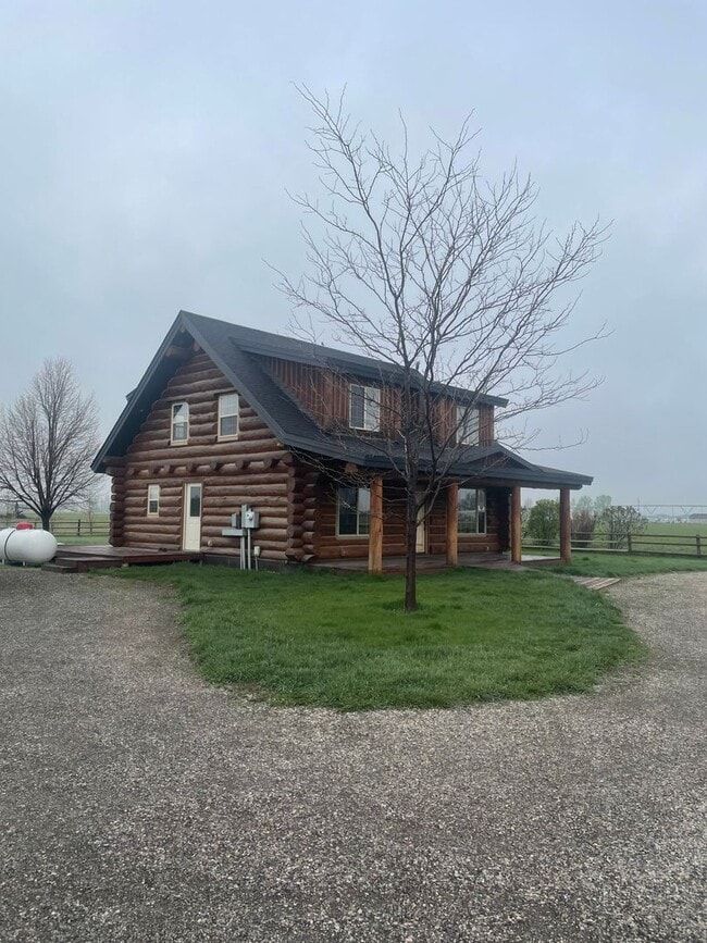 Building Photo - Charming Log Home For Rent with Large Shop & Spacious Yard