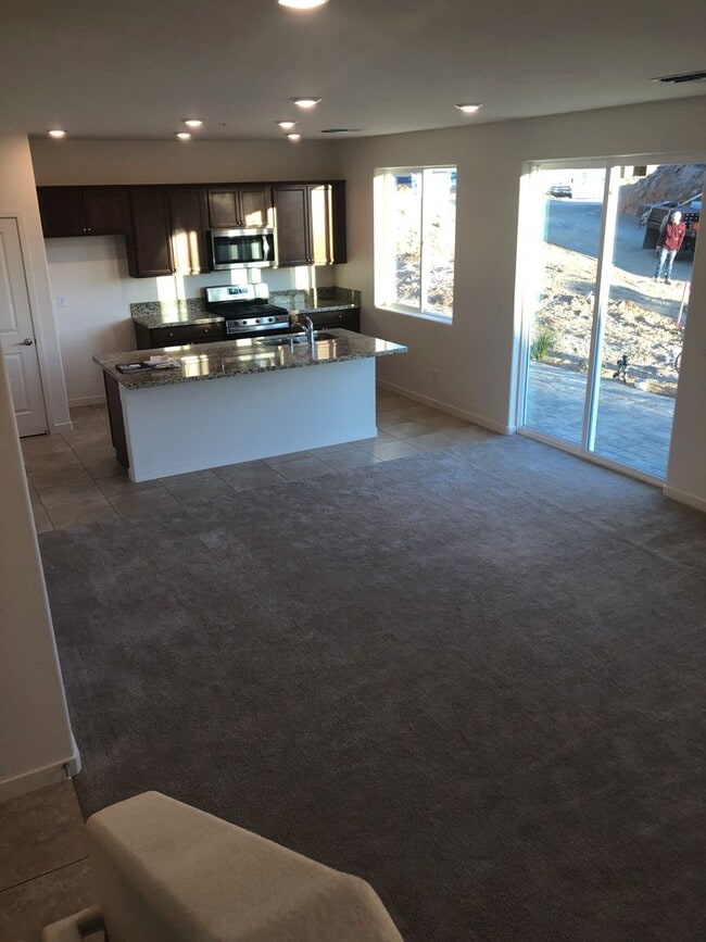 Building Photo - CORNER LOT - END UNIT - NO YARD TO MAINTAIN - GRANITE - STAINLESS - GATED
