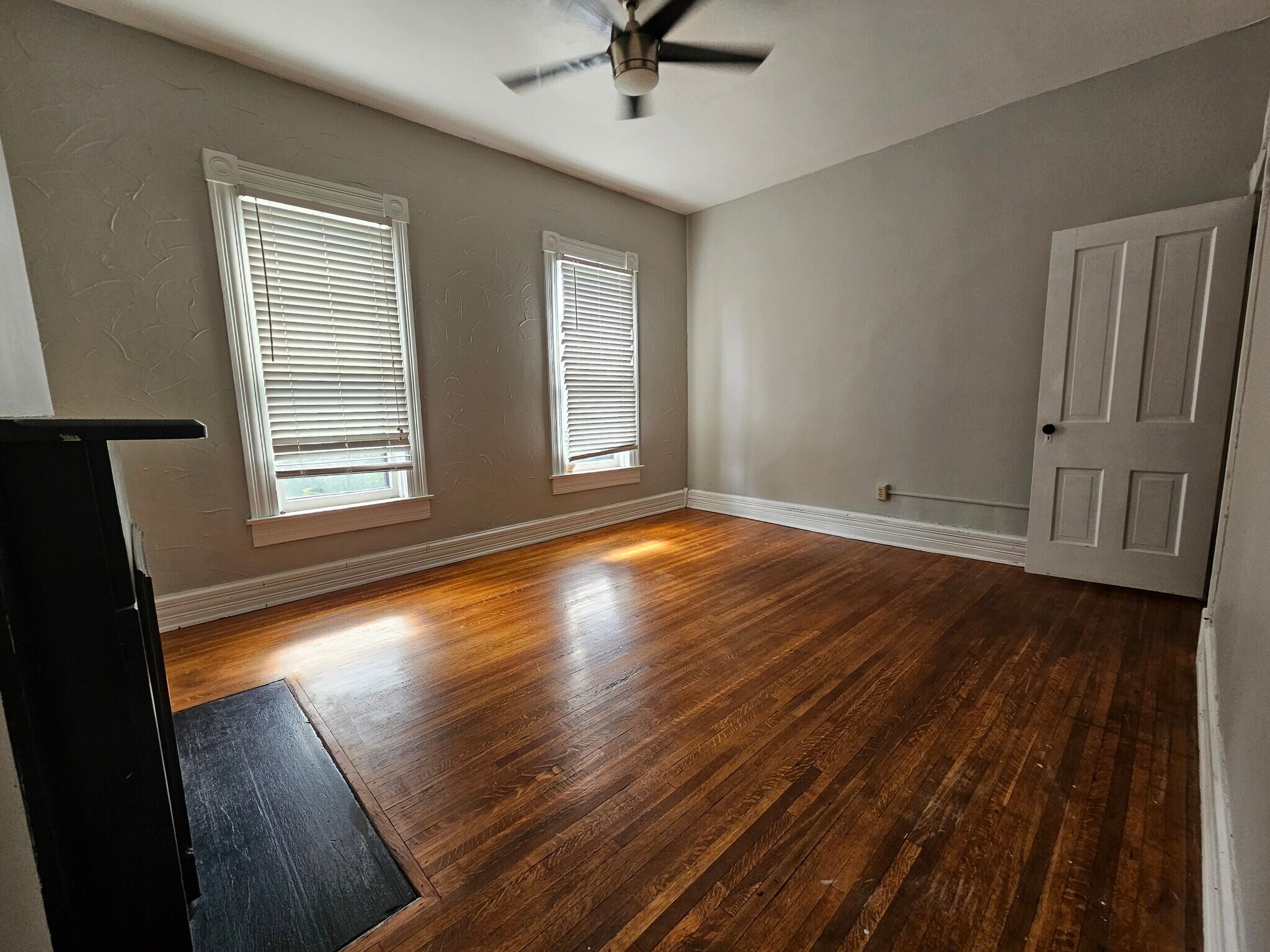 Primary master bedroom with a great street view and plenty of sunlight - 943 Highland St