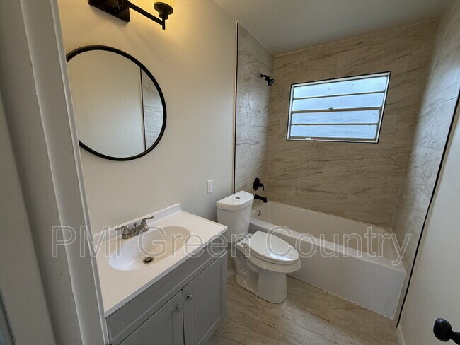 Building Photo - 336 W 61st Pl N