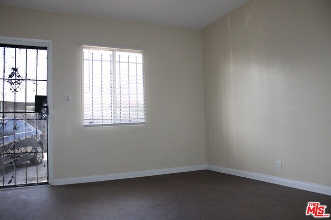 Building Photo - 6340 10th Ave