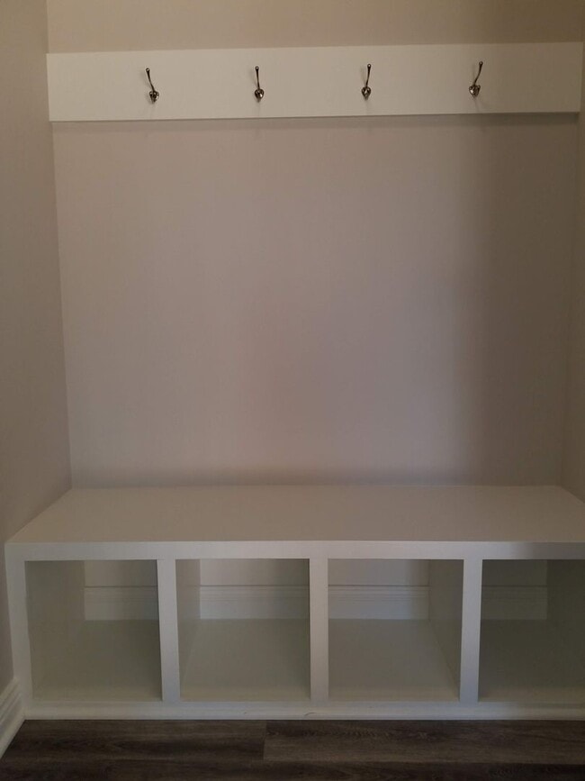 Building Photo - Daylight ranch townhome with 2 stall garage.  Private driveway and covered deck. high end finishe...