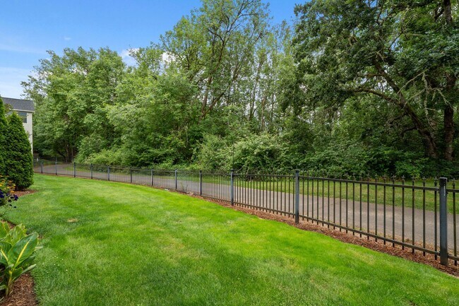 Building Photo - 2 Creeks Condominiums - Gated Community on...