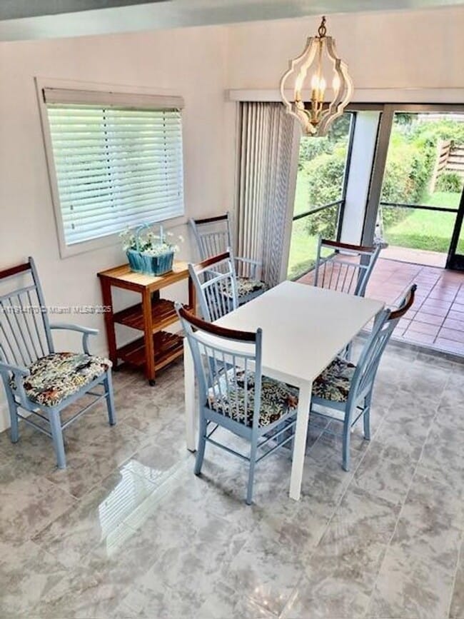 Building Photo - 7439 Twin Sabal Dr