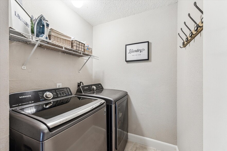 Laundry room with optional W/D available for rent - 13511 Windchase Ct