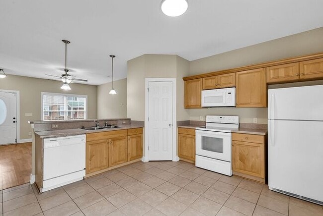 Building Photo - Where your commute is shorter than the Starbucks drive-thru line on 501. Grab the keys before som...