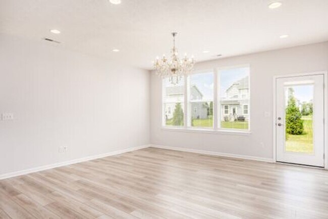 Building Photo - Updated 3-Bedroom Home with 3 Baths, Open-Concept Layout, Luxury Flooring & Bright Modern Kitchen