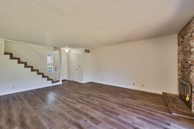 Building Photo - 3 Bedroom Home with Fireplace and LVP Flooring & 2-Car Garage!