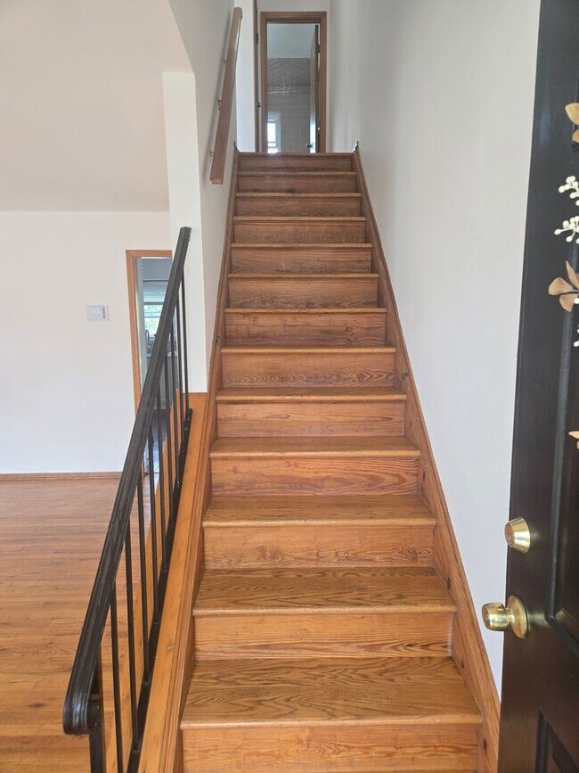 Building Photo - Updates abound at this SPACIOUS, half duplex with 3+ off-street parking spots, 3-bedrooms and 2 f...