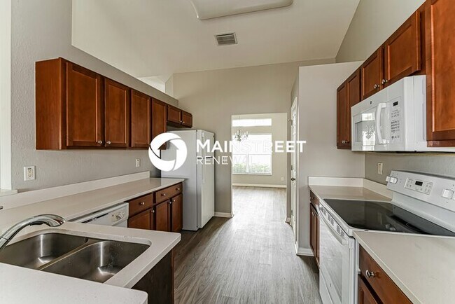 Building Photo - 4 Bedroom Pet-Friendly Home in Cape Coral, FL with Main Street Renewal