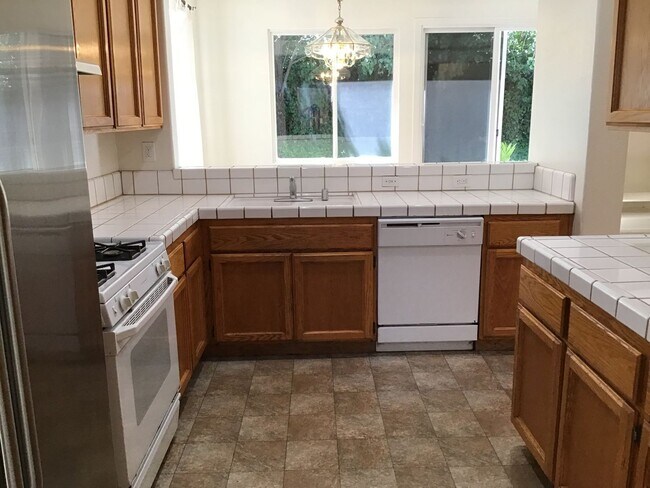 Building Photo - Three bedroom in gated community.