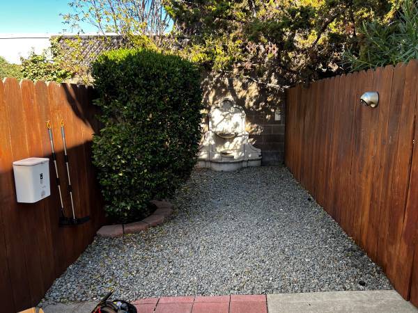 Doggie area with motion light and dog bags - 3456 Redwood Ct