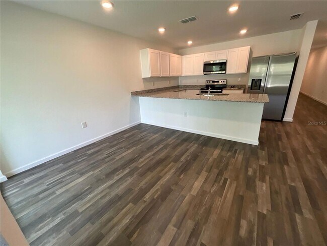 Building Photo - 7145 N Henderson Way