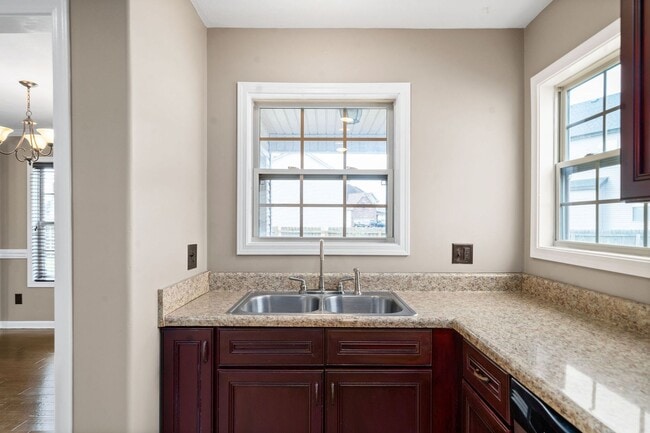 Building Photo - Pet Friendly Three Bedroom with Bonus!