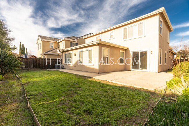 Building Photo - Spacious 4-Bed, 3-Bath Home with a Beautiful Garden in Mountain House! *FIRST FLOOR BEDROOM and F...