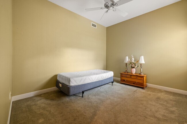 Building Photo - Experience Bell Tower Park. GATED ground floor 2 Bed 2 Bath Den 1 Car Garage Condo.