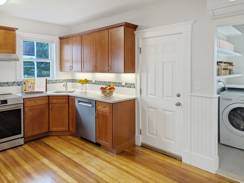 Kitchen and pantry/laundry room with in-unit washer and dryer - 22 Reed St